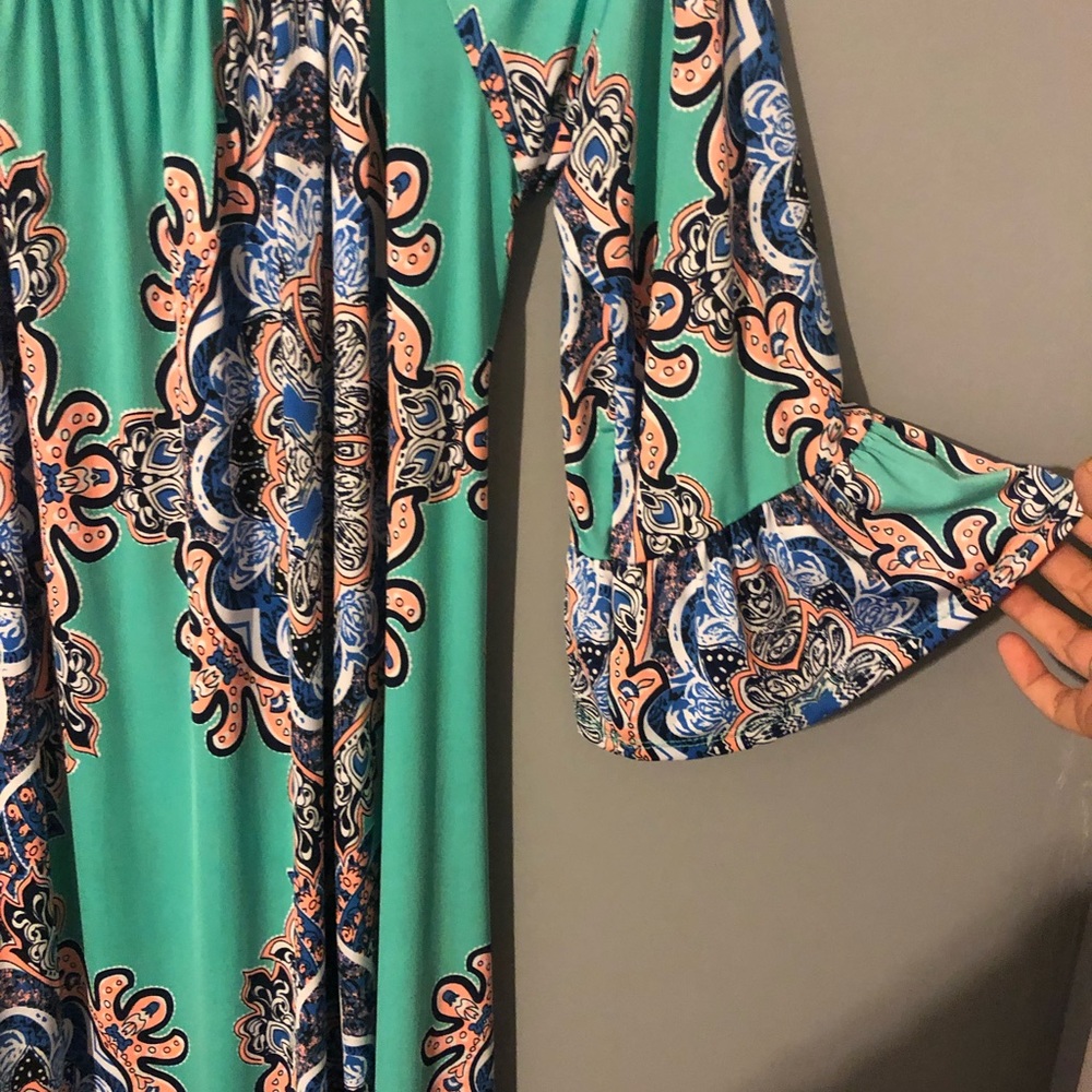 Teal green dress.